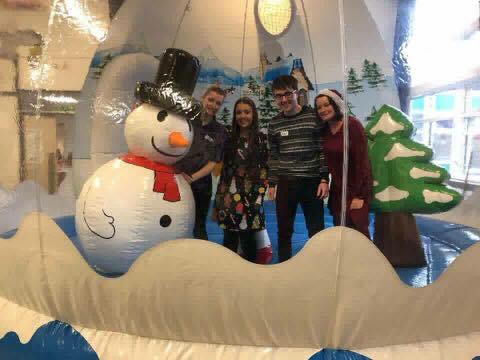 An inflatable snow globe bouncer on hire in Manchester