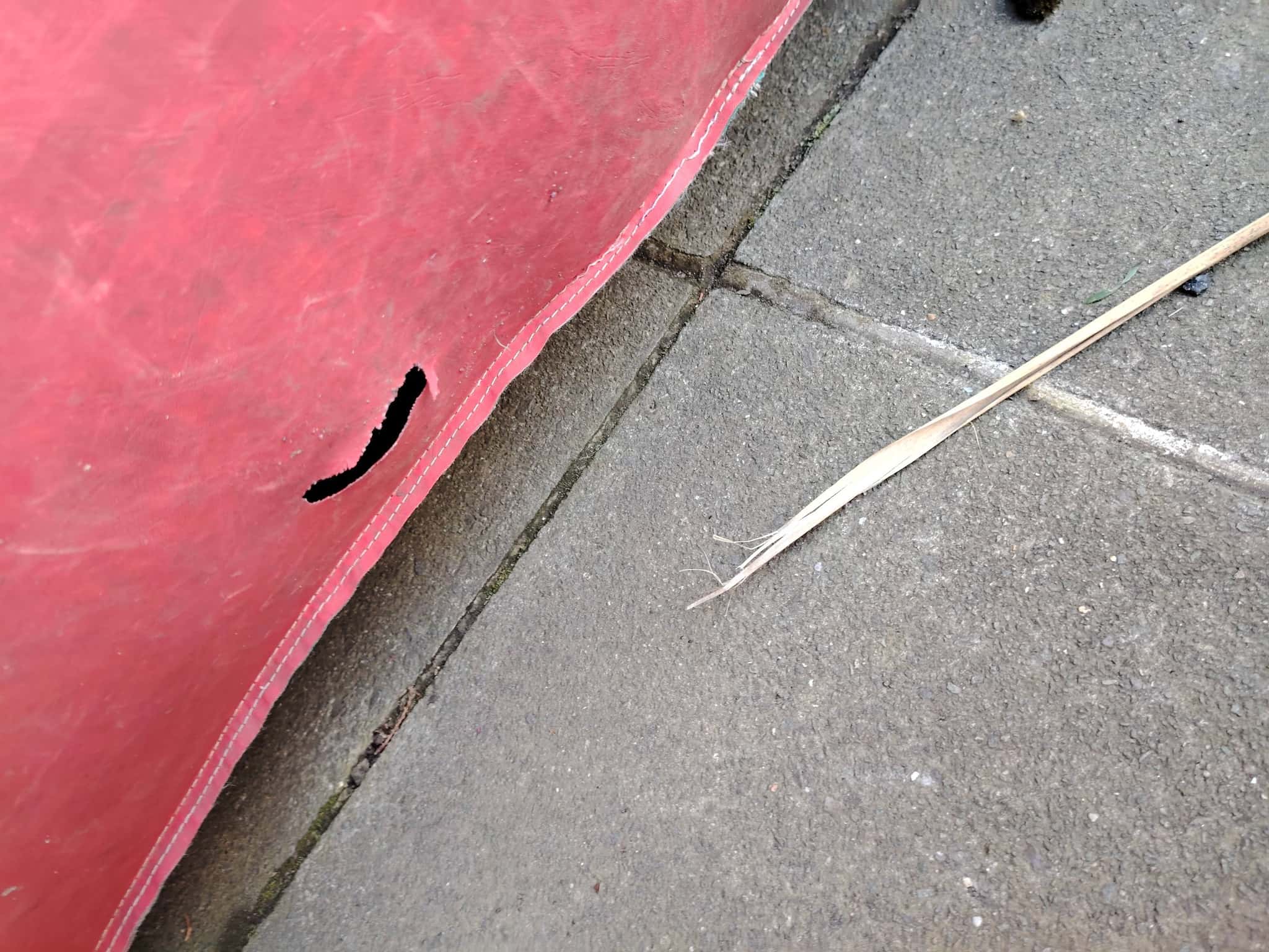 An image showing a tear in a bouncy castle