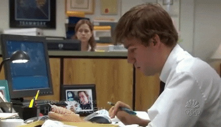 This animated image shows a tv character falling asleep at a computer A funny gif of tv character falling asleep at a computer