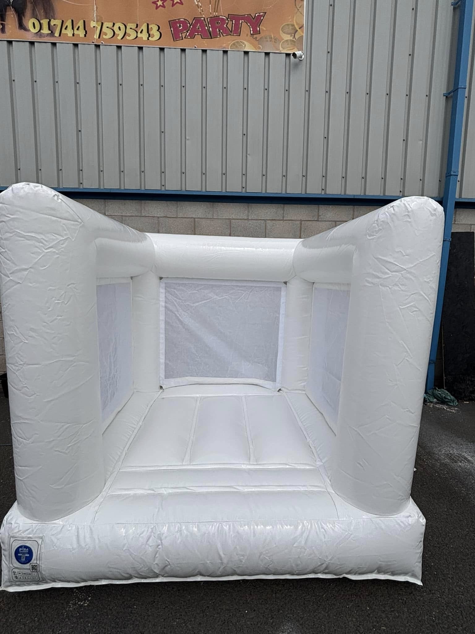 Mini white indoor bouncy castle