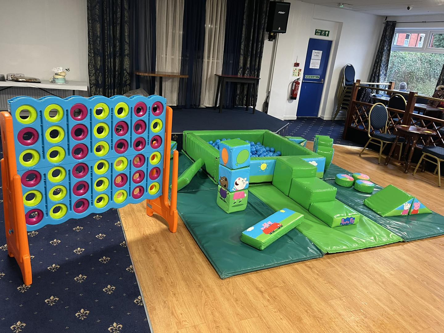 This image shows a Peppa Pig soft play set up supplied by SJ's Leisure