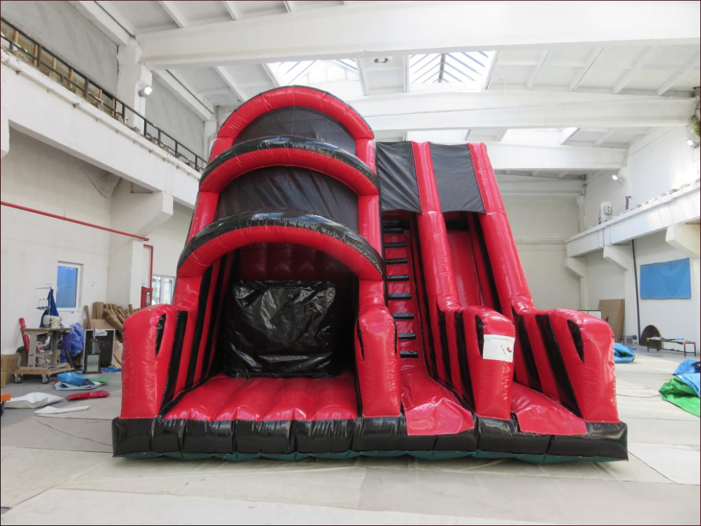 This image shows SJ's Leisure's brand new inflatable base jump and RUSH slide combo.