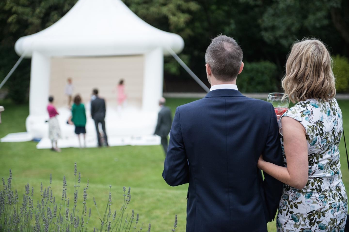 Mega white bouncy castle set up at a wedding reception in the North West